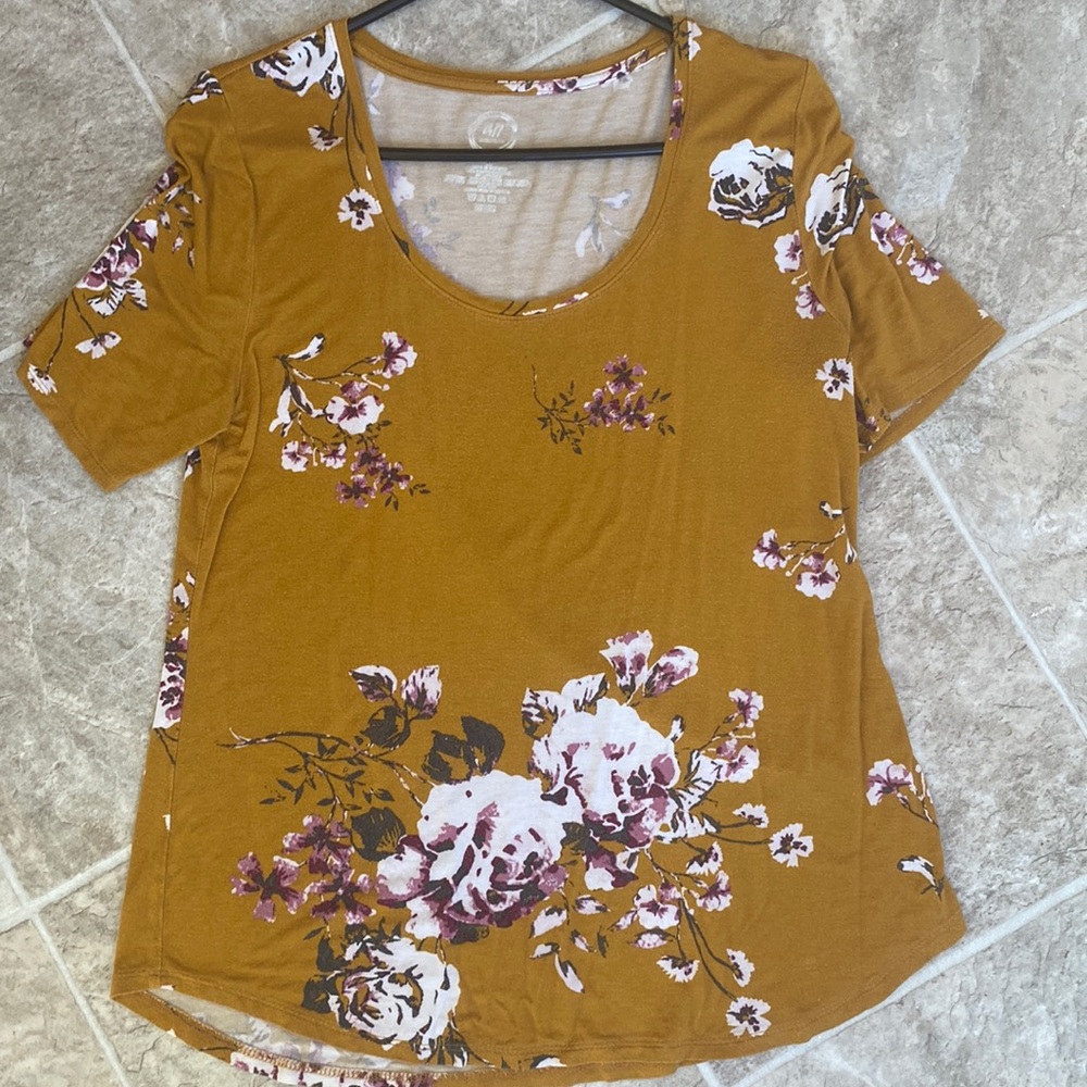 Medium mustard colored shirt